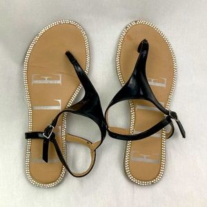 Black patent ELLE thong sandals encrusted with rhinestone crystals